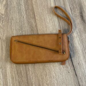 Brown hand held wallet